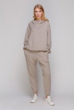 Сіро-бежеві звужені штани на манжеті фото 0