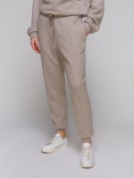 Сіро-бежеві звужені штани на манжеті фото 2