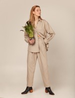 Бежевые брюки на высокой талии с рюшей фото 2