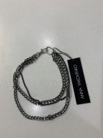 Прикраса на шию з коротких ланцюгів сірого та чорного кольору фото 1