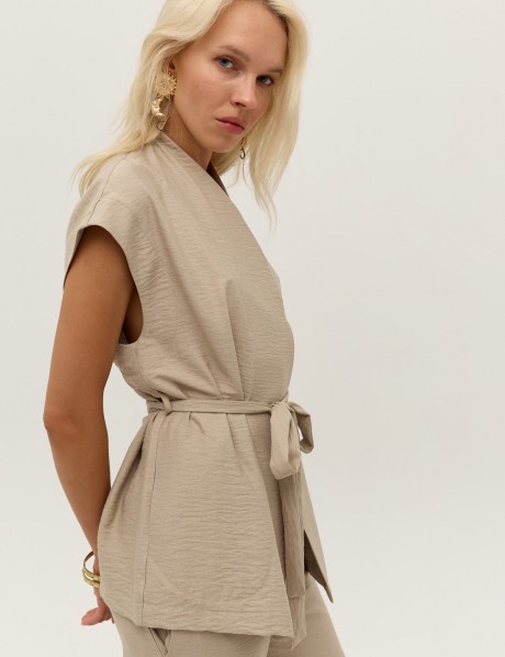 Бежевий жилет 39863986 купить